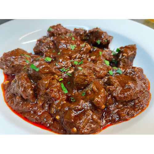 Man - Tindjan Spanish Beef Stew (West African Dish)